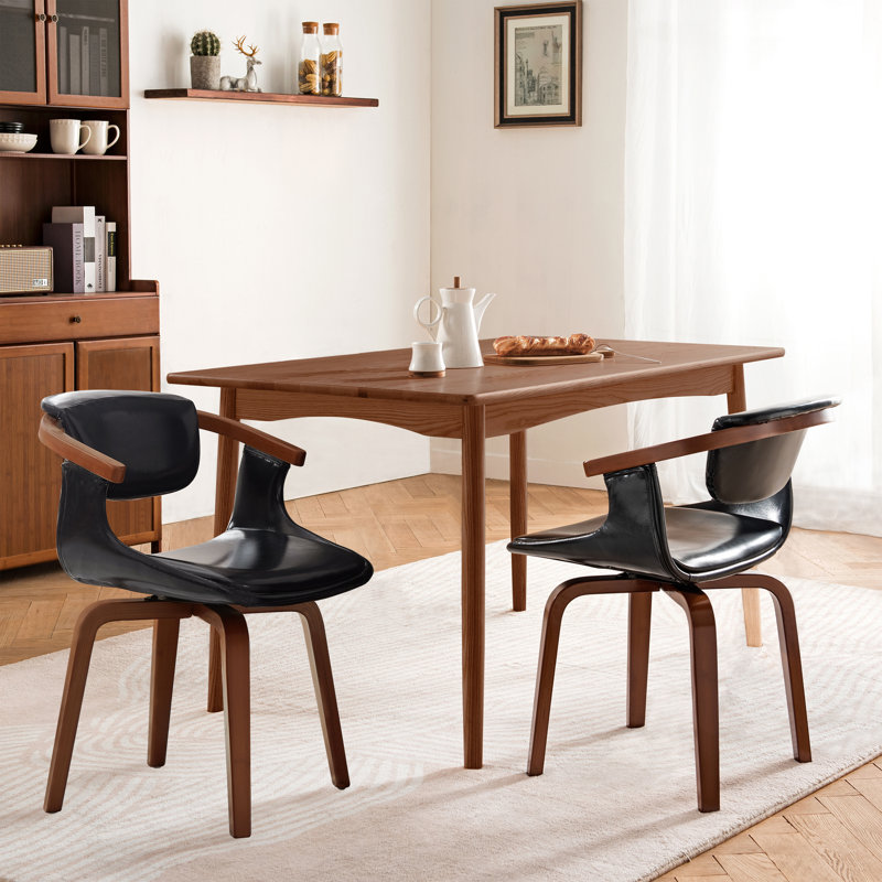 Wade Logan® Wathen Faux Leather Upholstered Swivel Dining Side Chair